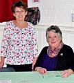 Mary and Linda greet guests
